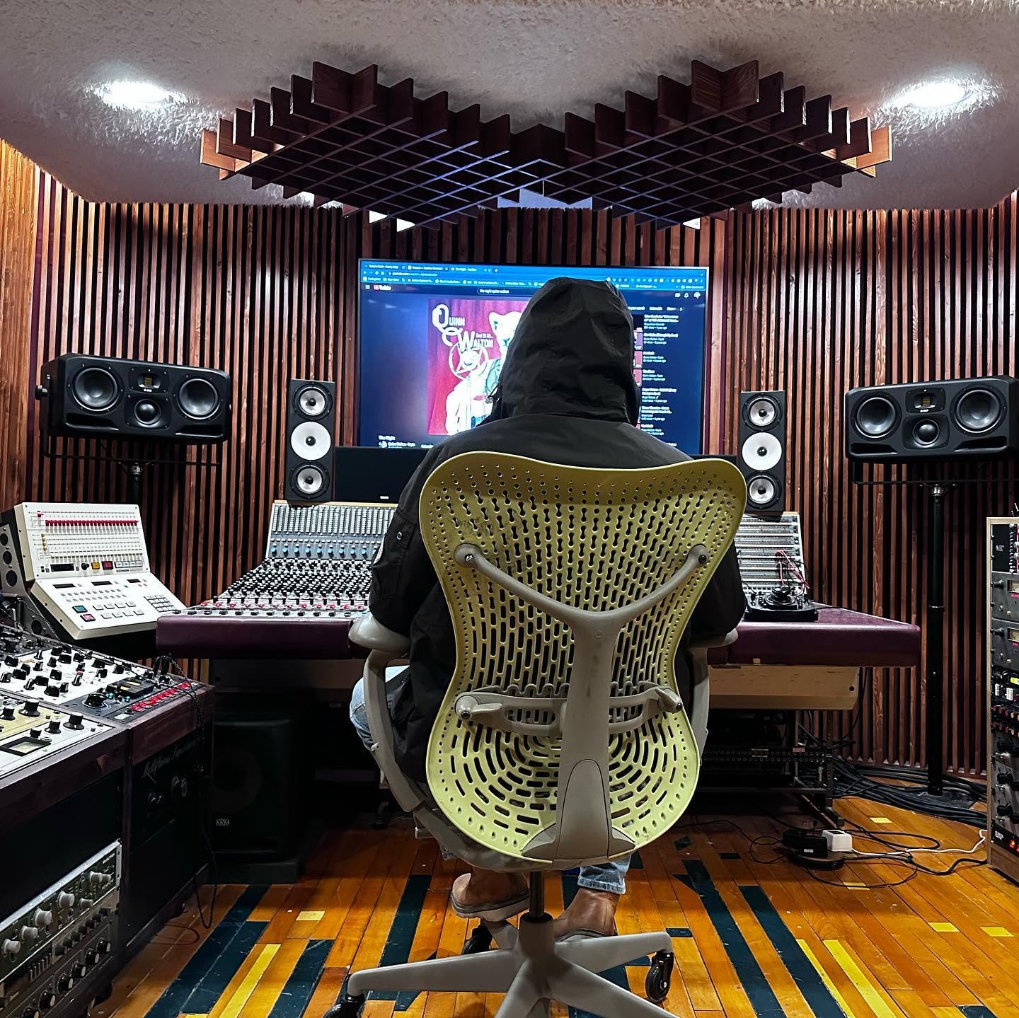 Quinn Walton listening in the control room at King Electric Recording Studio