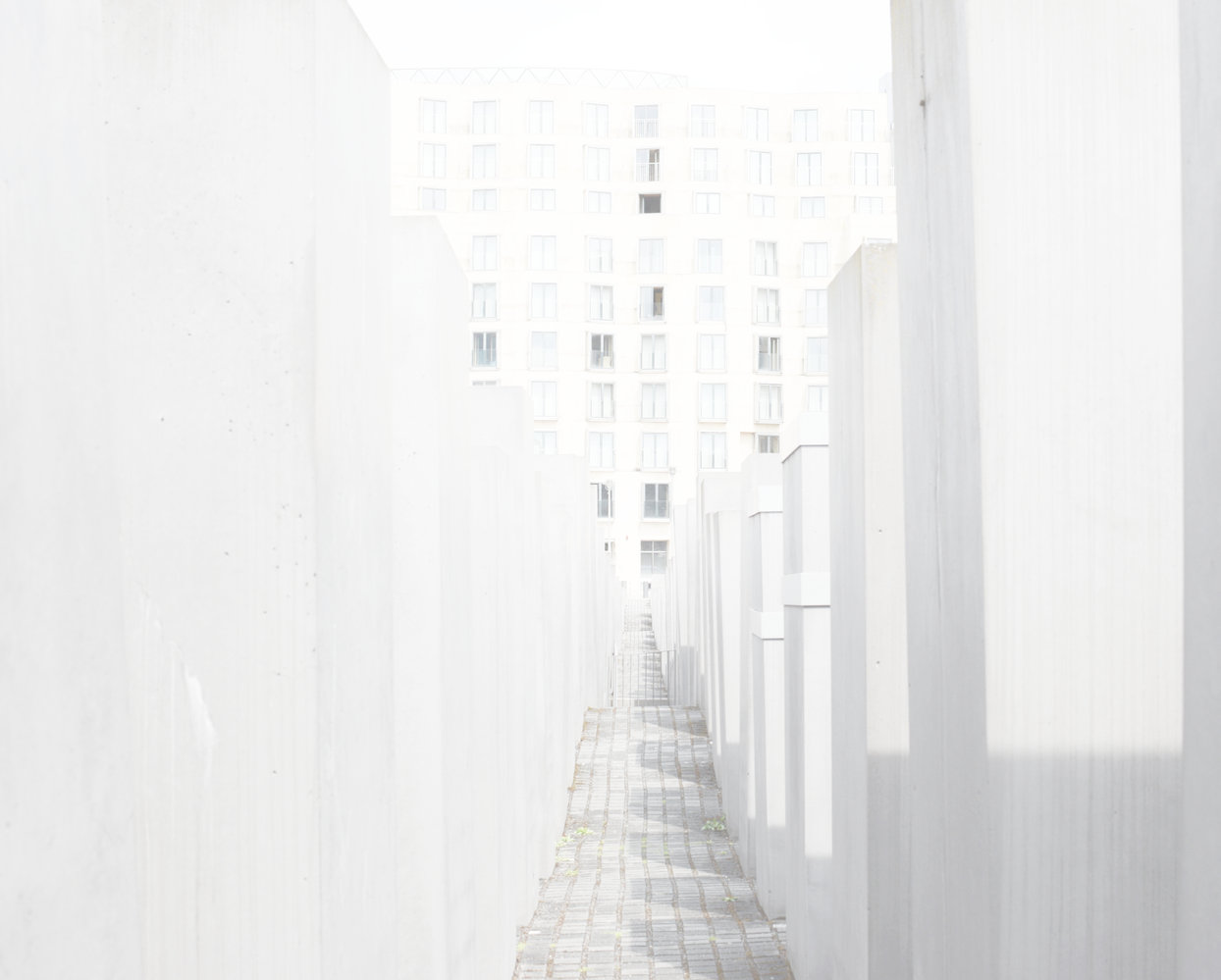 A bright architectural passageway photographed by Quinn Walton